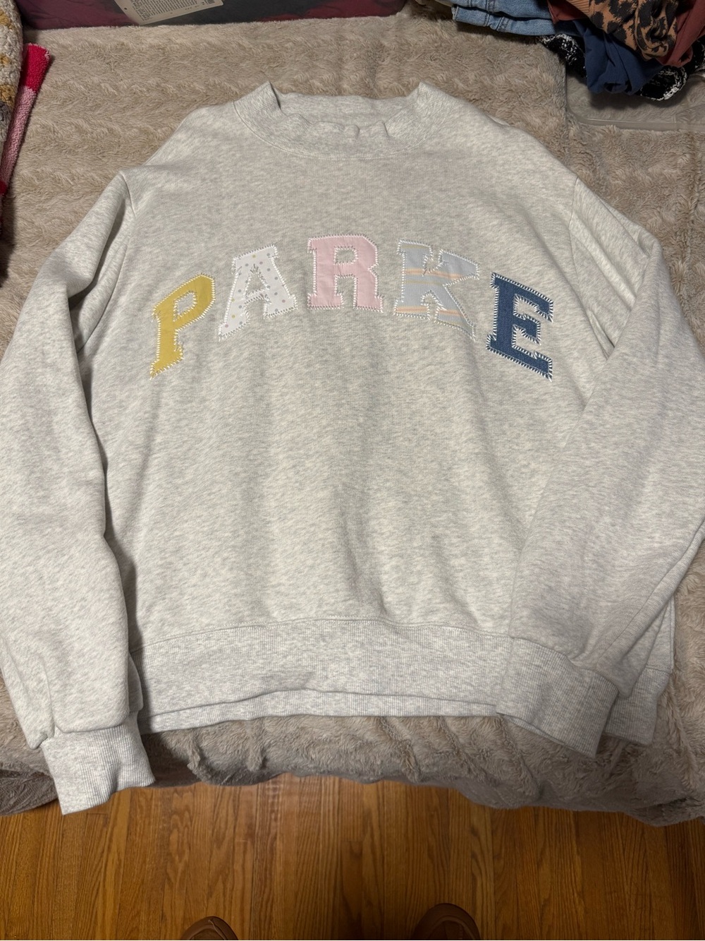 Sold out. Parke. Patchwork varsity mockneck